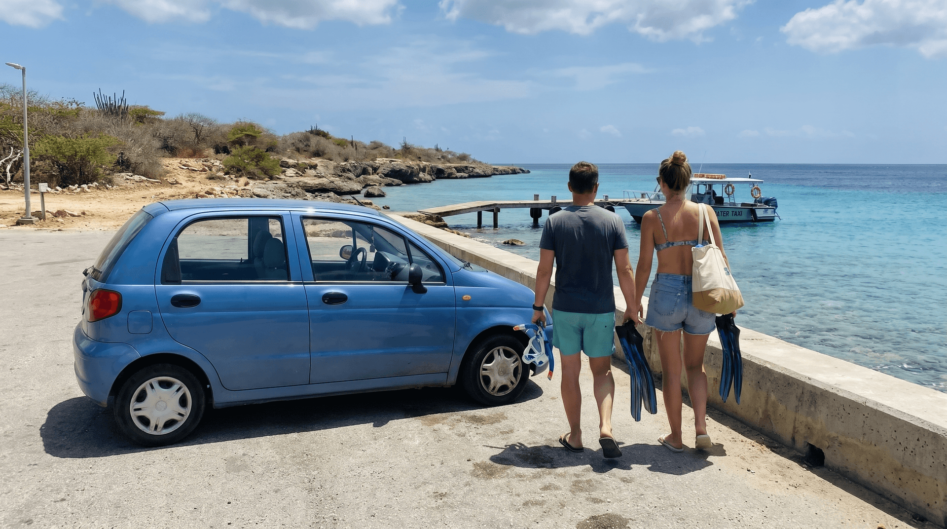 A couple carries snorkel gear past a blue rental hatchback on the Kralendijk waterfront towards the water taxi