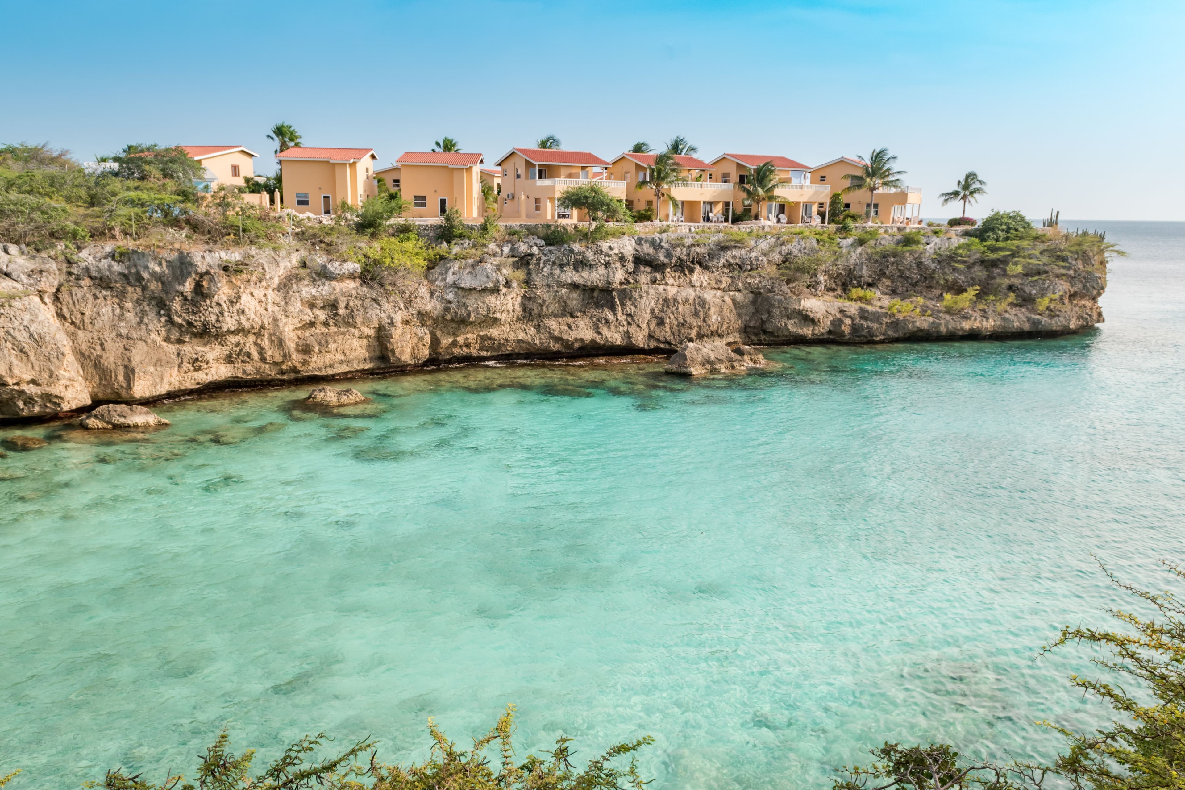 Playa Lagun on Curaçao, a small sheltered bay with clear water between the rocks